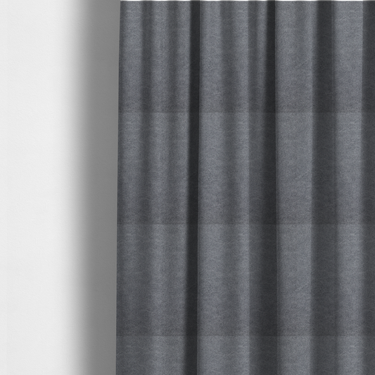 The fabric used to create these made-to-measure curtains is a charcoal or slate grey fabric with a rich, distressed felt-like texture. The surface features an intricate, stippled pattern of deep grey fibres mixed with lighter silver highlights. It is characterized by organic, vein-like distressing and light-coloured crackle lines, mimicking the look of weathered leather or heavy-duty industrial felt.