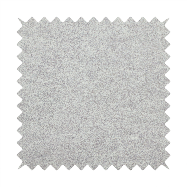 A silver fabric with a dense, mottled texture. The cool-toned purple and grey fibres create a hazy, weathered effect, punctuated by the collection’s signature light "crackle" distressing for a soft, weathered aesthetic.