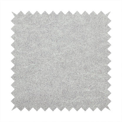A silver fabric with a dense, mottled texture. The cool-toned purple and grey fibres create a hazy, weathered effect, punctuated by the collection’s signature light "crackle" distressing for a soft, weathered aesthetic.