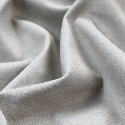 A silver fabric with a dense, mottled texture. The cool-toned purple and grey fibres create a hazy, weathered effect, punctuated by the collection’s signature light "crackle" distressing for a soft, weathered aesthetic.