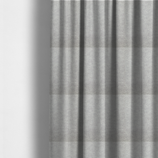 The fabric used to create these made-to-measure curtains is a silver fabric with a dense, mottled texture. The cool-toned purple and grey fibres create a hazy, weathered effect, punctuated by the collection’s signature light "crackle" distressing for a soft, weathered aesthetic.