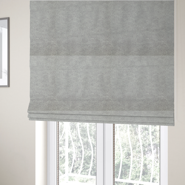 The fabric used to create these Roman blinds is a silver fabric with a dense, mottled texture. The cool-toned purple and grey fibres create a hazy, weathered effect, punctuated by the collection’s signature light "crackle" distressing for a soft, weathered aesthetic.