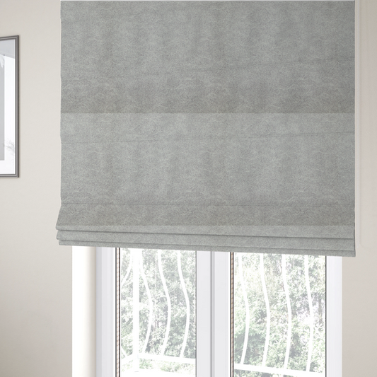 The fabric used to create these Roman blinds is a silver fabric with a dense, mottled texture. The cool-toned purple and grey fibres create a hazy, weathered effect, punctuated by the collection’s signature light "crackle" distressing for a soft, weathered aesthetic.