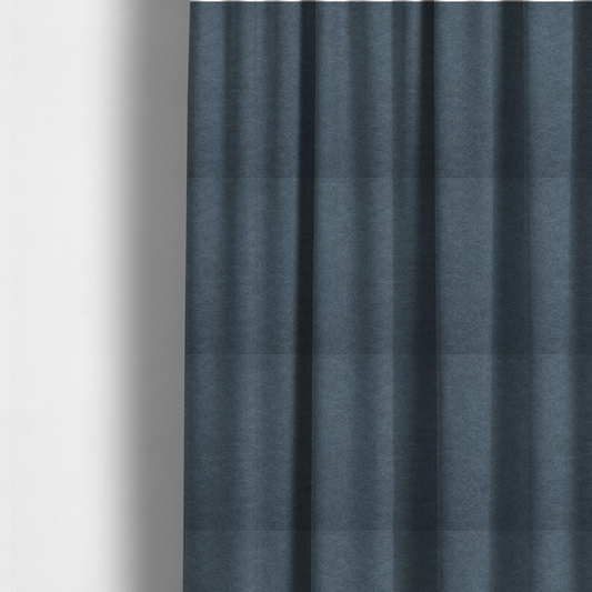 The fabric used to create these made-to-measure curtains is a dark navy or midnight blue fabric with a dense, distressed felt-like texture. This material is the darkest blue in the collection, featuring a tight, mottled blend of deep indigo and slate grey fibres. It is characterized by the signature organic, light-coloured "crackle" veins that give it the weathered appearance of premium distressed suede or heavy-duty industrial wool.