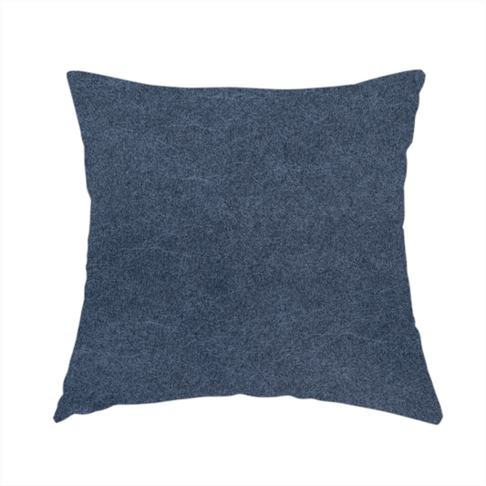 The fabric used to create this handmade cushion is a dark slate or indigo blue fabric with a dense, distressed felt-like texture. As the deepest blue in this collection, the surface features a rich mottled blend of midnight blue and dark grey fibres. It is characterized by organic, light-coloured "crackle" lines that provide a weathered, vintage look similar to distressed leather or premium industrial wool.