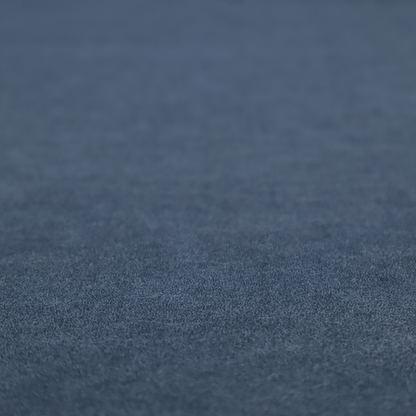 A dark slate or indigo blue fabric with a dense, distressed felt-like texture. As the deepest blue in this collection, the surface features a rich mottled blend of midnight blue and dark grey fibres. It is characterized by organic, light-coloured "crackle" lines that provide a weathered, vintage look similar to distressed leather or premium industrial wool.