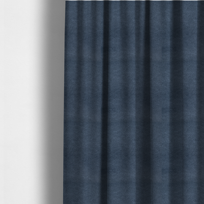 The fabric used to create these made-to-measure curtains is a dark slate or indigo blue fabric with a dense, distressed felt-like texture. As the deepest blue in this collection, the surface features a rich mottled blend of midnight blue and dark grey fibres. It is characterized by organic, light-coloured "crackle" lines that provide a weathered, vintage look similar to distressed leather or premium industrial wool.