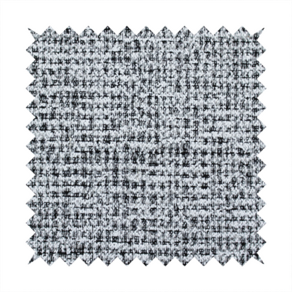 A textured woven upholstery fabric in a cool-toned grey and white salt-and-pepper pattern. The bouclé-style weave features horizontal rhythmic variations of charcoal and light grey yarns.