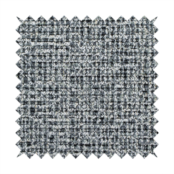 A dense, textured woven fabric in a charcoal and ash-grey salt-and-pepper pattern. The weave features tightly packed, nubby bouclé yarns with a subtle vertical and horizontal grid-like structure.