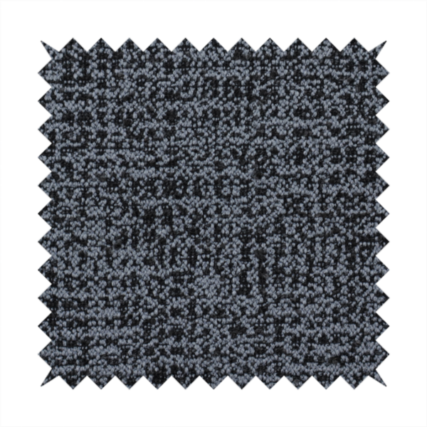 A dark, heavyweight woven fabric with a deep slate and charcoal marl pattern. The dense bouclé weave creates a low-contrast, pebbled texture with a uniform, dark grey appearance.
