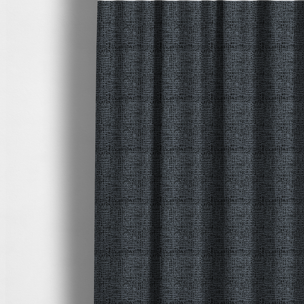 The fabric used to create these made-to-measure curtains is a dark, heavyweight woven fabric with a deep slate and charcoal marl pattern. The dense bouclé weave creates a low-contrast, pebbled texture with a uniform, dark grey appearance.