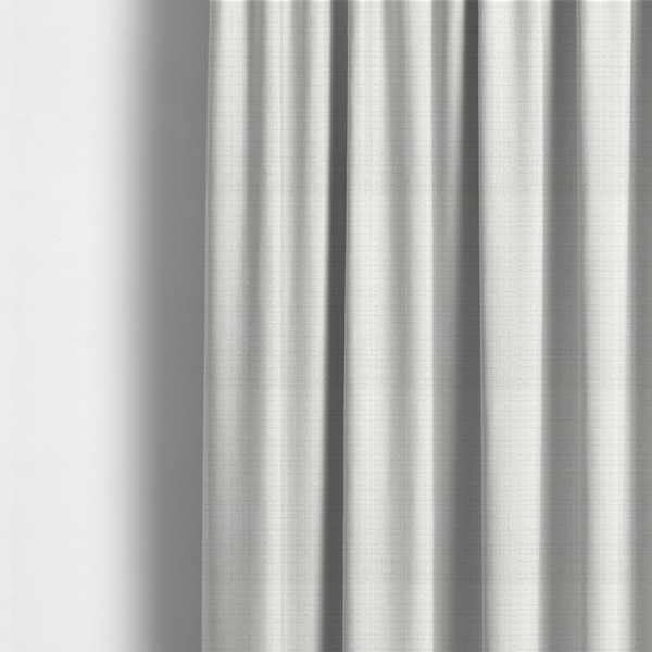 The fabric used to create these made-to-measure curtains is a off-white upholstery fabric. The material features a chunky, nubby boucle texture arranged in a soft horizontal and vertical grid pattern, creating a cosy and dimensional tactile surface.