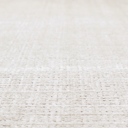 A cream and oatmeal-toned fabric. The material features a chunky, multi-tonal boucle weave with a distinct grid pattern and organic snubbed yarns, creating a dimensional and rustic look.