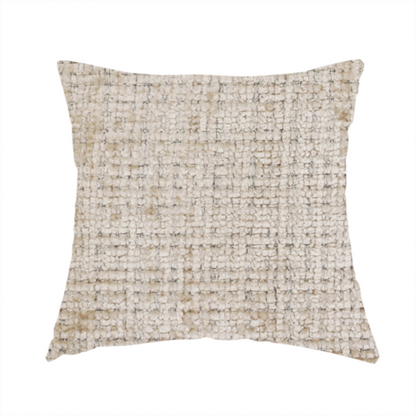 The fabric used to create this handmade cushion is a beige and sand-toned upholstery fabric. The material features a chunky, multi-layered boucle texture with a prominent architectural grid pattern and a mix of warm tan and ivory yarns.