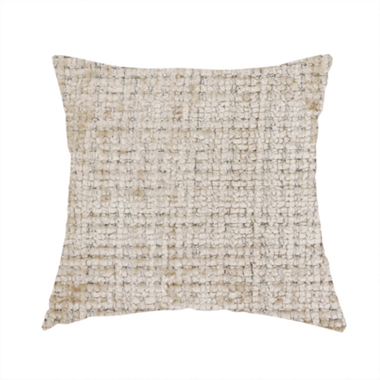 The fabric used to create this handmade cushion is a beige and sand-toned upholstery fabric. The material features a chunky, multi-layered boucle texture with a prominent architectural grid pattern and a mix of warm tan and ivory yarns.