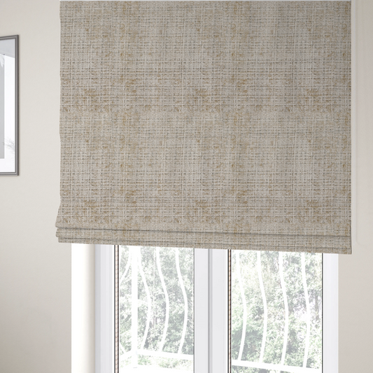 The fabric used to create these Roman blinds is a beige and sand-toned upholstery fabric. The material features a chunky, multi-layered boucle texture with a prominent architectural grid pattern and a mix of warm tan and ivory yarns.