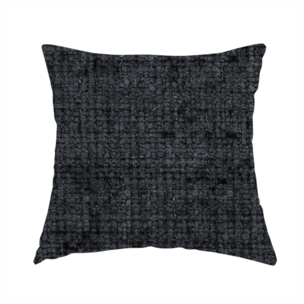 The fabric used to create these handmade cushions is a dark charcoal upholstery fabric. The material features a heavy boucle texture with a prominent, recessed grid pattern, creating a rich, tactile surface with deep shadows and sophisticated dark grey tones.