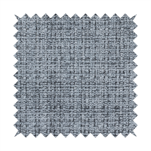 A slate blue and grey textured boucle fabric with a dense, dimensional grid weave.