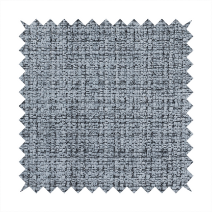 A slate blue and grey textured boucle fabric with a dense, dimensional grid weave.