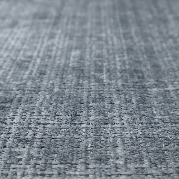 A slate blue and grey textured boucle fabric with a dense, dimensional grid weave.