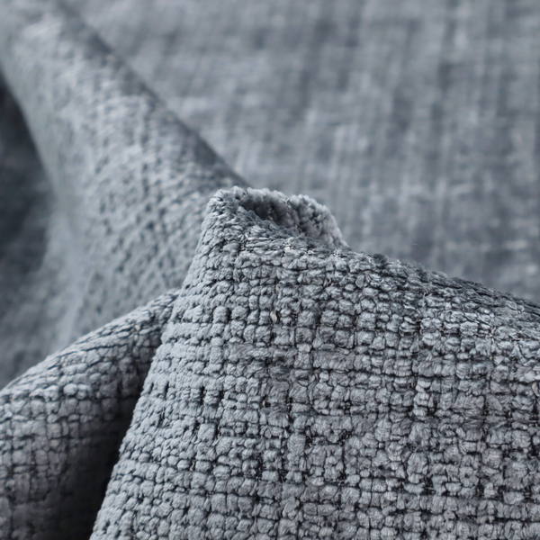 A slate blue and grey textured boucle fabric with a dense, dimensional grid weave.
