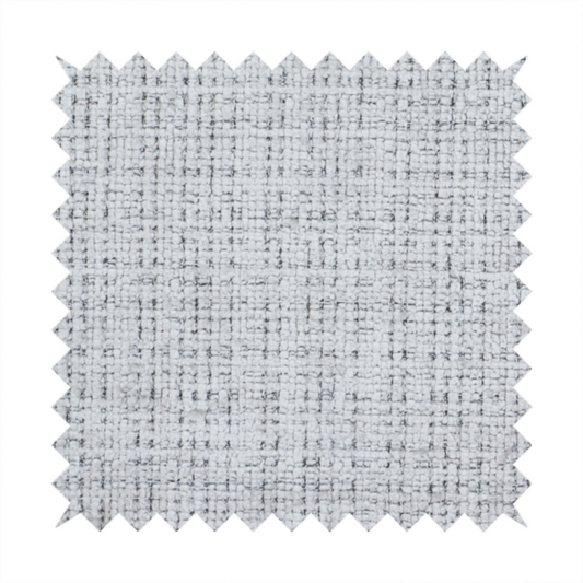 A light grey upholstery fabric. This material features a dense boucle texture with a prominent architectural grid pattern. The weave combines pale grey and charcoal-flecked yarns, creating a sophisticated, salt-and-pepper dimensional effect.