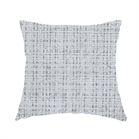 The fabric used to create this handmade cushion is a light grey upholstery fabric. This material features a dense boucle texture with a prominent architectural grid pattern. The weave combines pale grey and charcoal-flecked yarns, creating a sophisticated, salt-and-pepper dimensional effect.