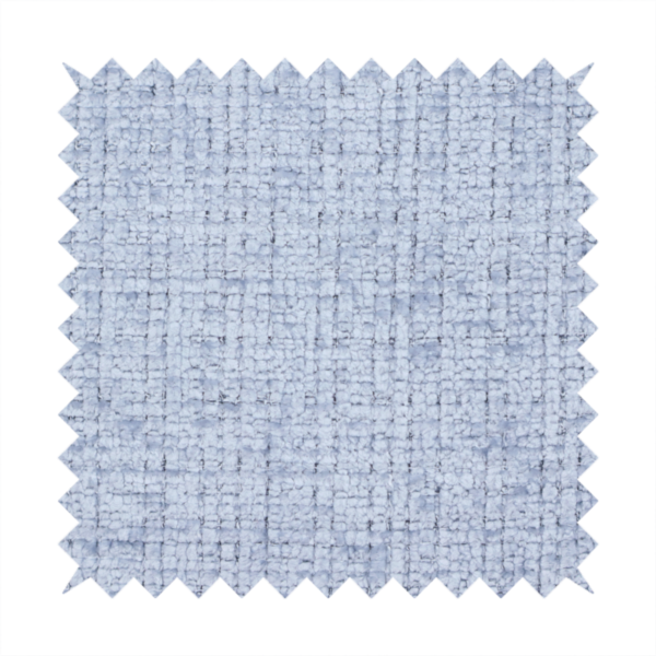 A Scanno weave upholstery fabric in an Ice Blue shade, featuring a textured, woven pattern with small, grid-like interlocking threads.