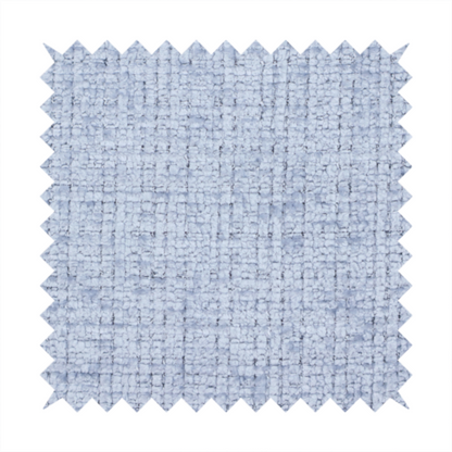 A Scanno weave upholstery fabric in an Ice Blue shade, featuring a textured, woven pattern with small, grid-like interlocking threads.