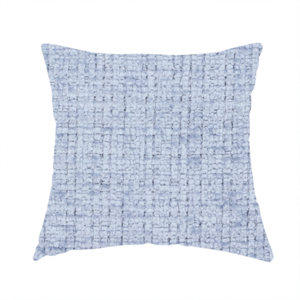 The fabric used to create these handmade cushions is a Scanno weave upholstery fabric in an Ice Blue shade, featuring a textured, woven pattern with small, grid-like interlocking threads.