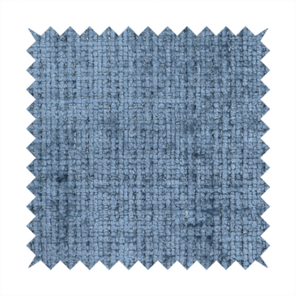 Scanno Weave upholstery fabric in a medium blue shade, featuring a detailed, woven texture with an interlocking grid pattern.