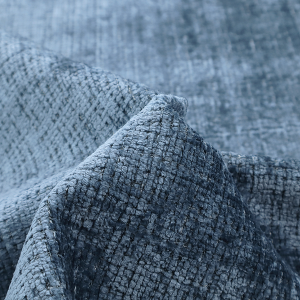 Scanno Weave upholstery fabric in a medium blue shade, featuring a detailed, woven texture with an interlocking grid pattern.