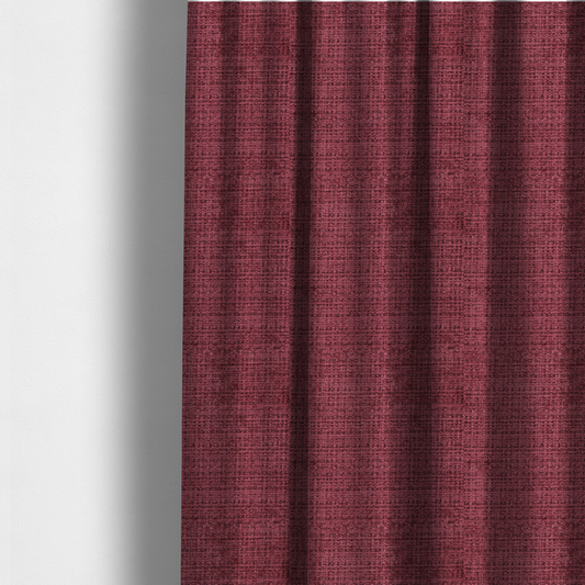 The fabric used to create these made-to-measure curtains is a Scanno Weave upholstery fabric in a deep red shade, showcasing a detailed, woven texture with an interlocking grid pattern.