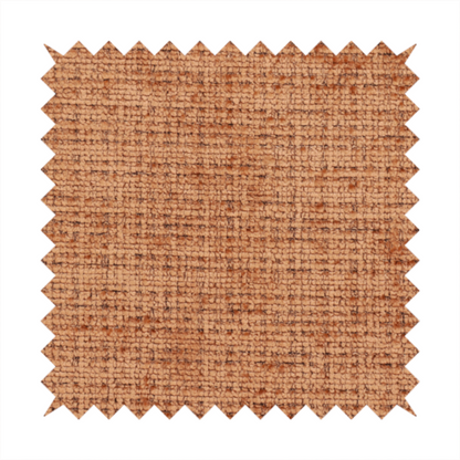 Scanno Weave upholstery fabric in a warm tan shade, showcasing a detailed, woven texture with an interlocking grid pattern.