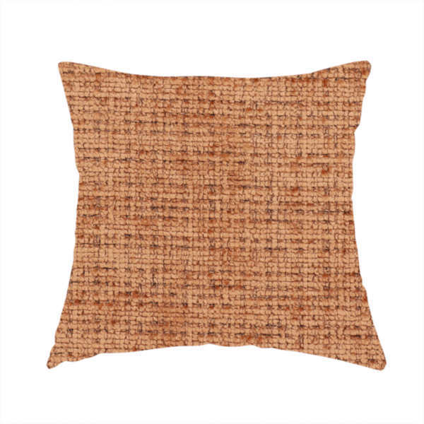 The fabric used to create these handmade cushions is a Scanno Weave upholstery fabric in a warm tan shade, showcasing a detailed, woven texture with an interlocking grid pattern.