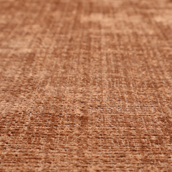 Scanno Weave upholstery fabric in a warm tan shade, showcasing a detailed, woven texture with an interlocking grid pattern.