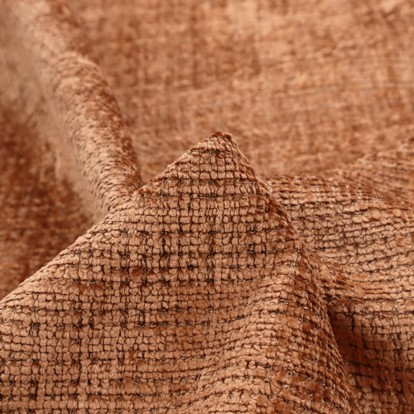 Scanno Weave upholstery fabric in a warm tan shade, showcasing a detailed, woven texture with an interlocking grid pattern.