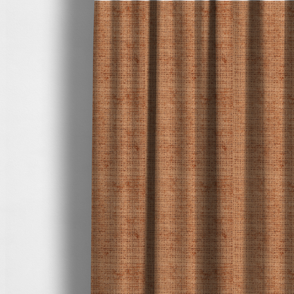 The fabric used to create these made-to-measure curtains is a Scanno Weave upholstery fabric in a warm tan shade, showcasing a detailed, woven texture with an interlocking grid pattern.
