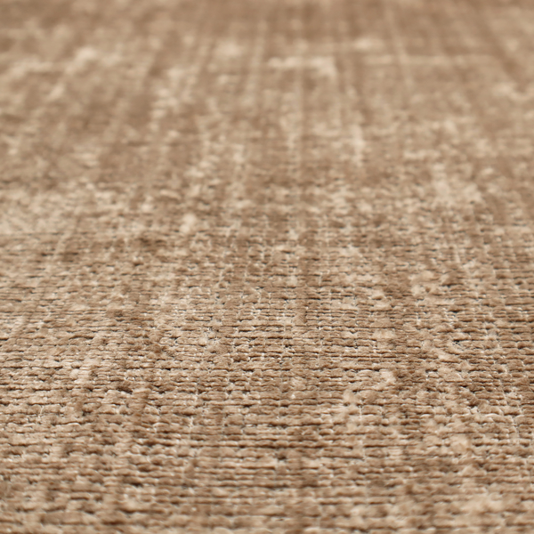 Scanno Weave upholstery fabric in a warm beige shade, showcasing a detailed, woven texture with an interlocking grid pattern.