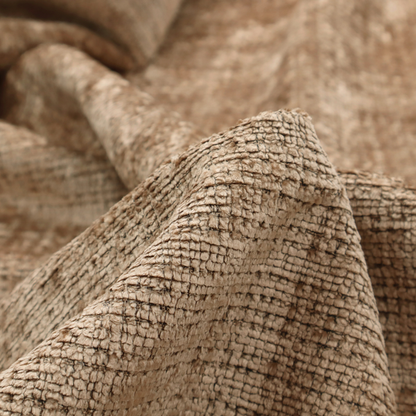 Scanno Weave upholstery fabric in a warm beige shade, showcasing a detailed, woven texture with an interlocking grid pattern.