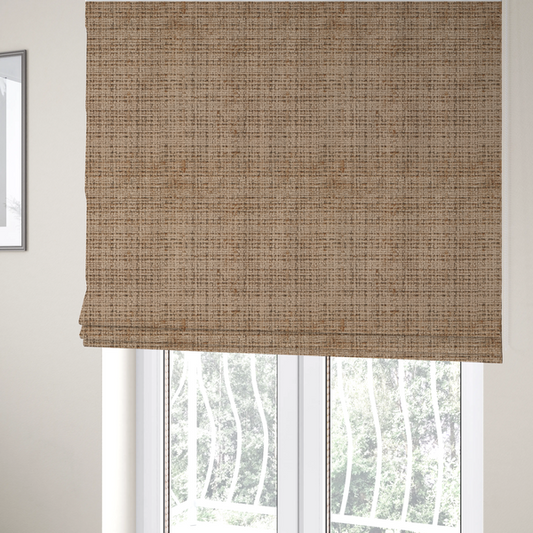 The fabric used to create these Roman blinds is a Scanno Weave upholstery fabric in a warm beige shade, showcasing a detailed, woven texture with an interlocking grid pattern.