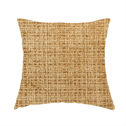 The fabric used for this handmade cushion is a Scanno Weave upholstery fabric in a golden honey shade, showcasing a detailed, woven texture with an interlocking grid pattern.