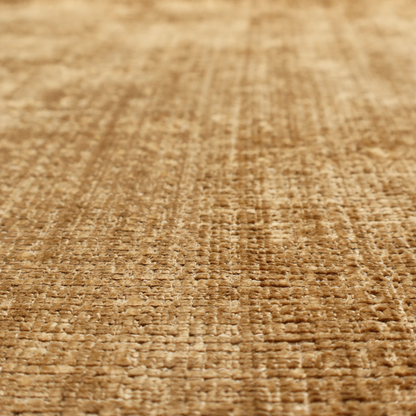 Scanno Weave upholstery fabric in a golden honey shade, showcasing a detailed, woven texture with an interlocking grid pattern.