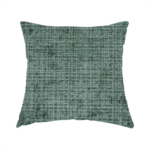 The fabric used to create this handmade cushion is a Scanno Weave upholstery fabric in a deep forest green shade, featuring a detailed, woven texture with an interlocking grid pattern.