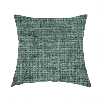 The fabric used to create this handmade cushion is a Scanno Weave upholstery fabric in a deep forest green shade, featuring a detailed, woven texture with an interlocking grid pattern.