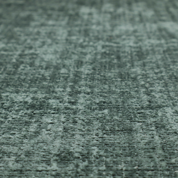 Scanno Weave upholstery fabric in a deep forest green shade, featuring a detailed, woven texture with an interlocking grid pattern.