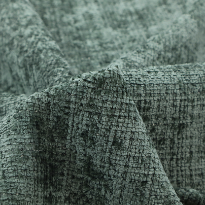 Scanno Weave upholstery fabric in a deep forest green shade, featuring a detailed, woven texture with an interlocking grid pattern.