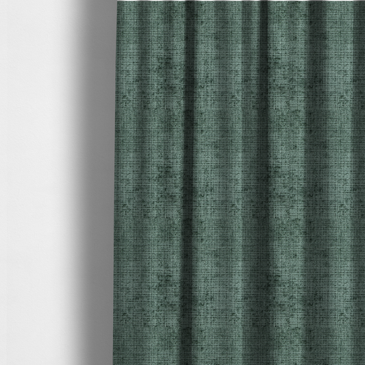 The fabric used to create these made-to-measure curtains is a Scanno Weave upholstery fabric in a deep forest green shade, featuring a detailed, woven texture with an interlocking grid pattern.