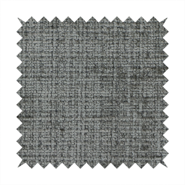 Scanno Weave upholstery fabric in a neutral grey shade, featuring a detailed, woven texture with an interlocking grid pattern.