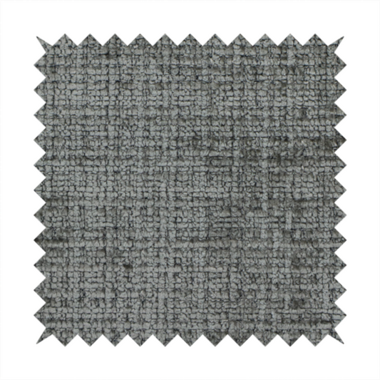 Scanno Weave upholstery fabric in a neutral grey shade, featuring a detailed, woven texture with an interlocking grid pattern.